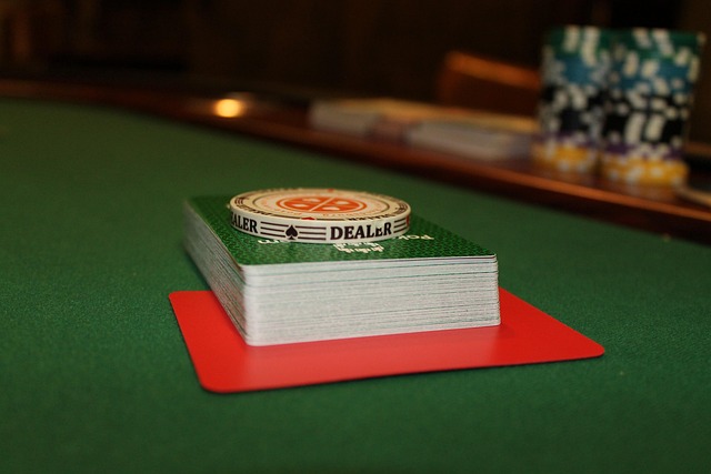 Poker table with dealer button and cards